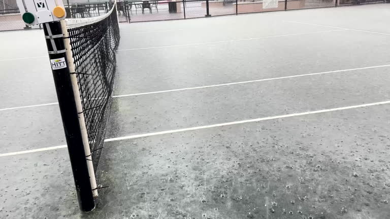 Rénovation terrain de tennis en béton poreux paris