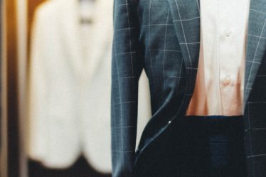 man in black suit jacket
